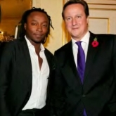 Freddie Achom with Former PM David Cameron